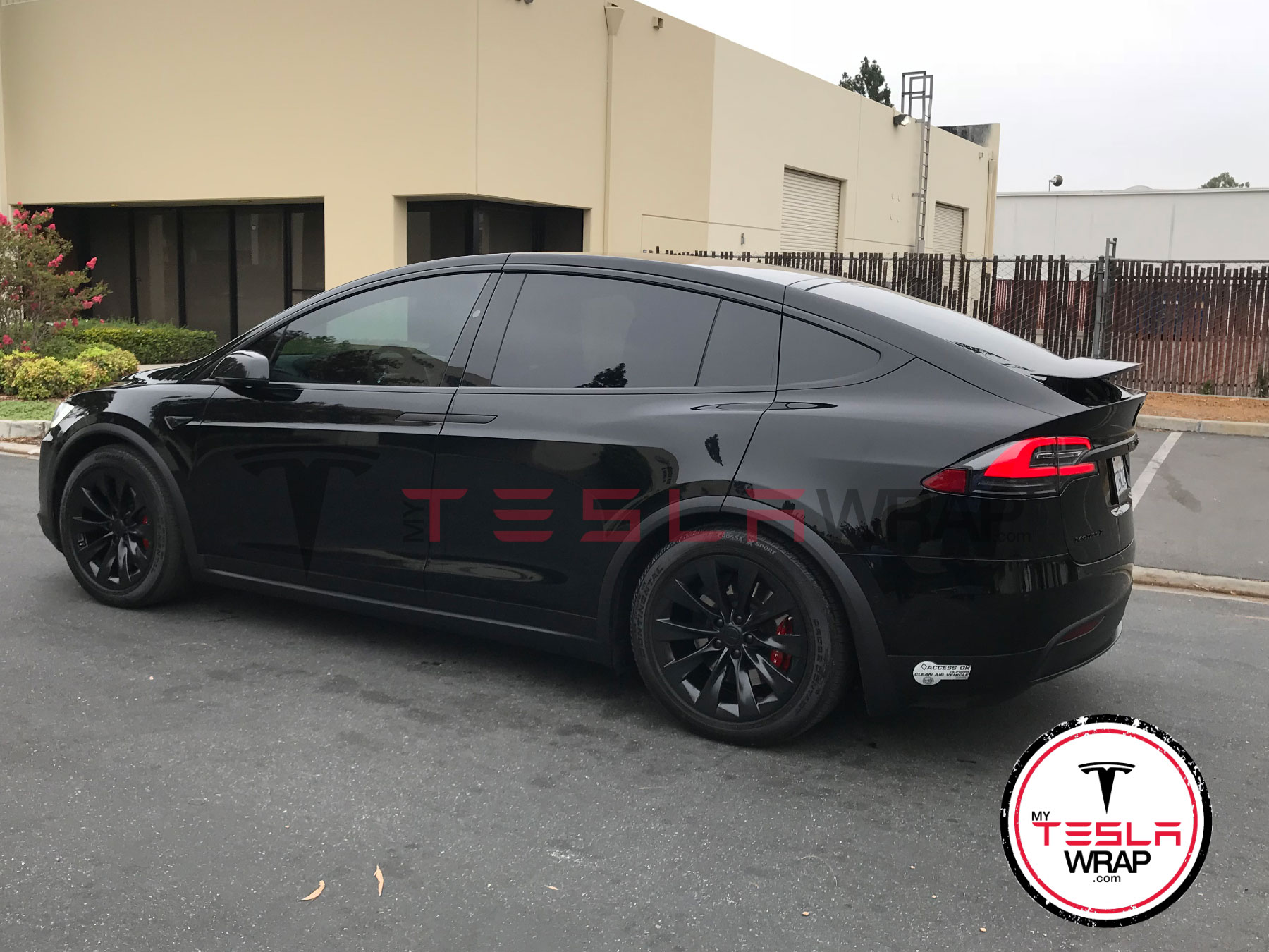 Tesla Model X satin black vinyl car wrap 