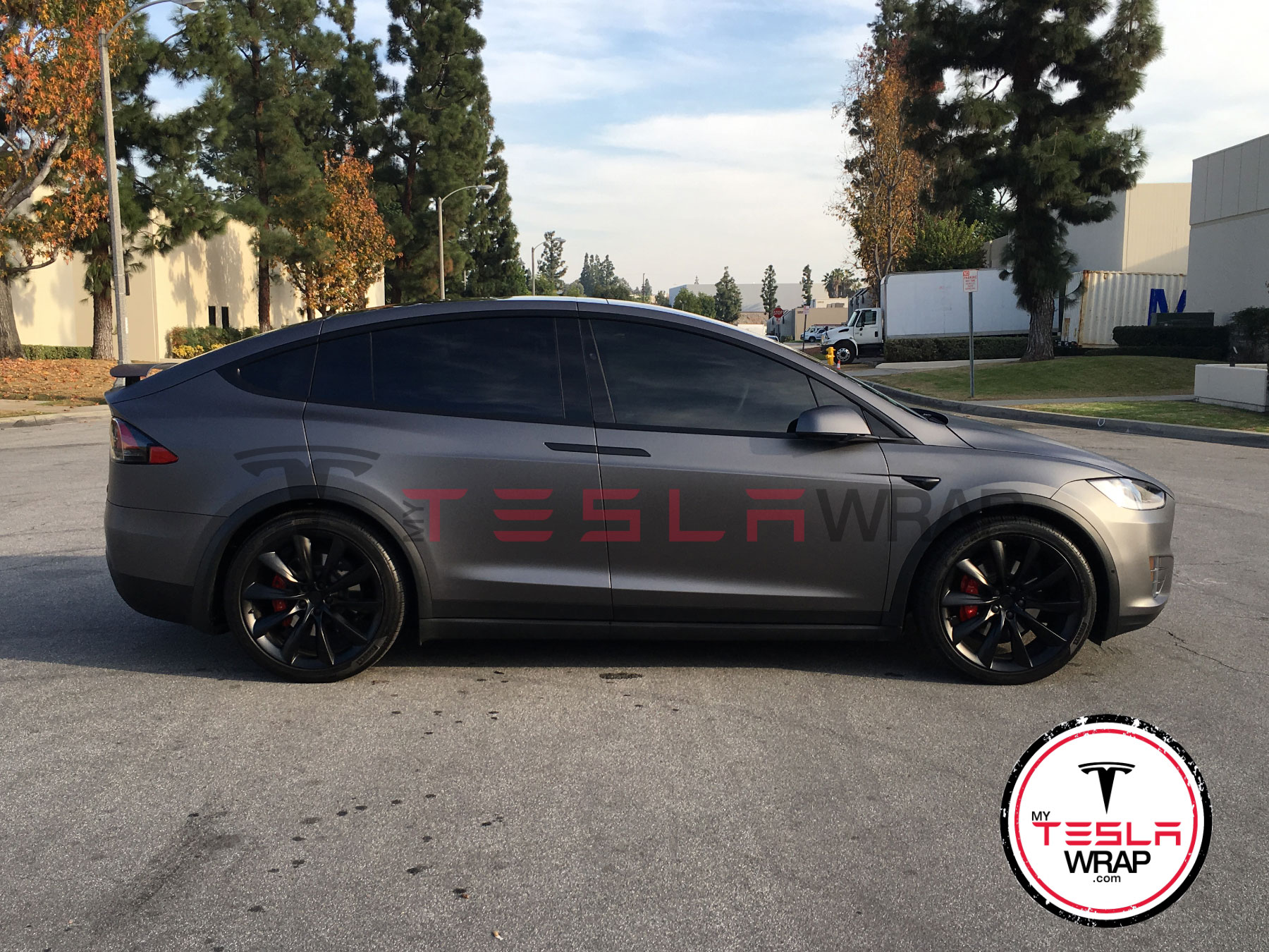 Tesla Model X matte black vinyl car wrap